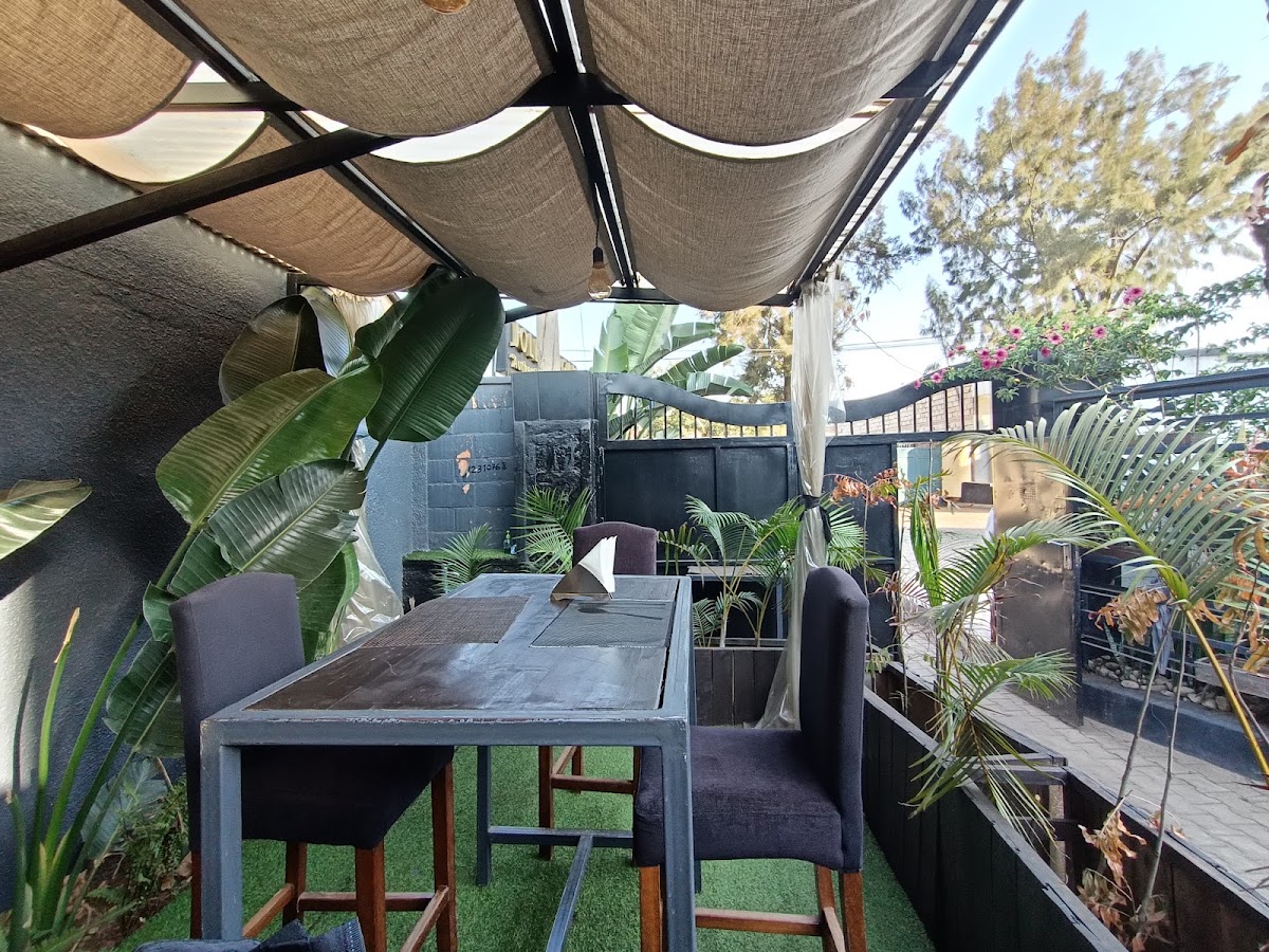 Jollof Kigali — the West African community anchor restaurant, the natural landing spot for Ghanaian visitors