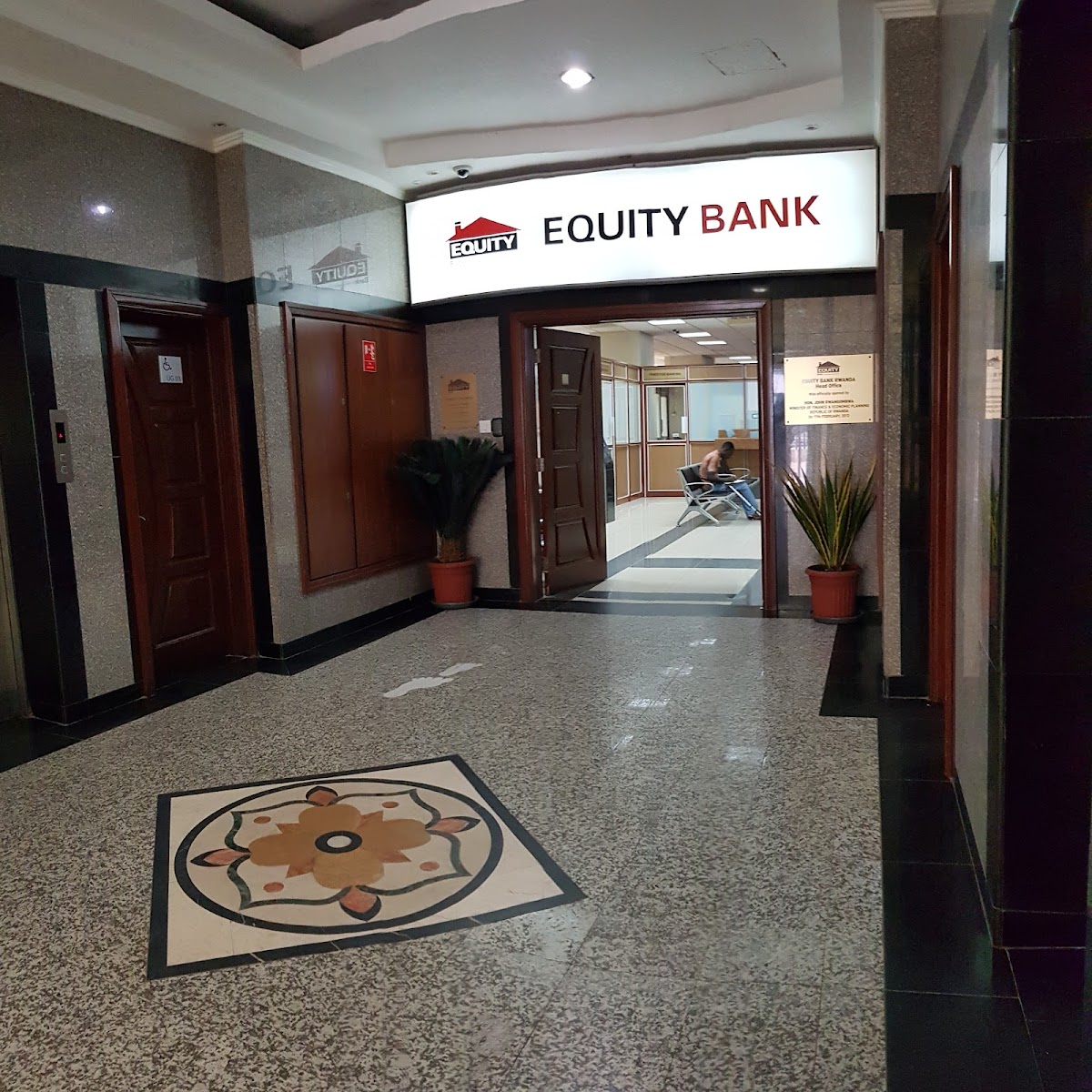 Equity Bank headquarters in Kigali — the formal-finance setting where PAYE remittances are processed monthly